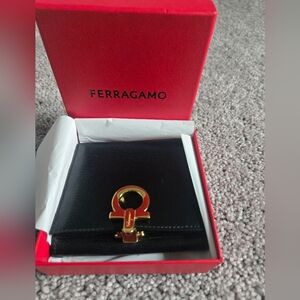 Ferragamo Black Wallet with Gold Accent